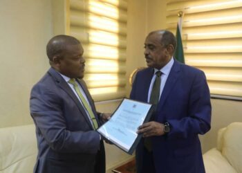 Ambassador Rashid Yahya Ssemuddu presents a copy of credentials to the Minister of Foreign Affairs of the  Republic of Sudan, Hon. Ambassador Ali Al Sadiq