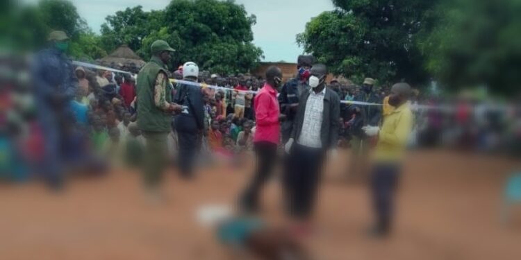 The police detectives of Patongo Central Police Station in Agago District conducting their inquiries at the scene of the crime