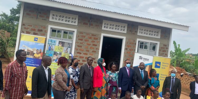 Evelyn Birabwa Nakyazze's new house donated by Habitat for Humanity Uganda, Buganda Kingdom and Housing Finance Bank