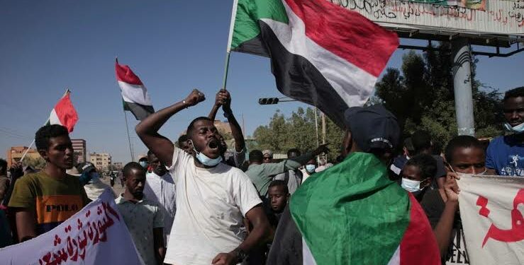 Sudanese youth in a protest