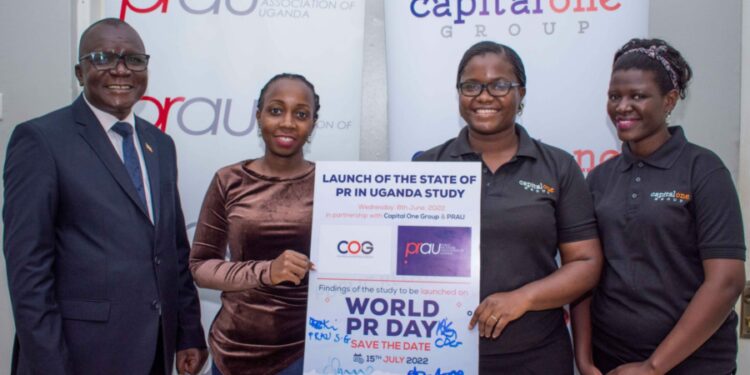 PRAU President Stephen Mwanga followed by PRAU Secretary General Allen Ssempa on the right; and then Charlene Mugalula Capital One Group(COG) PR Manager and Kezia Koburungi-PR Executive at COG on the left.