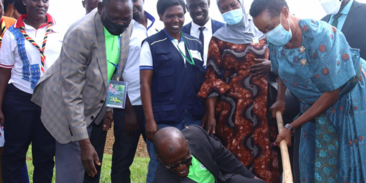 Minister Aisha Sekindi and ED NEMA planting a tree