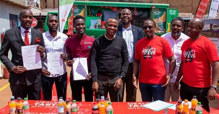 All partners pose together for a picture after the MOU signing today at Plastic Recycling Industries. Partners include; KCCA, Asante waste management, Yo-waste, Ecoplastile and PRI representatives