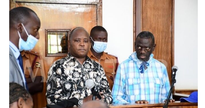 Lubega Mukaaku and and Dr Kizza Besigye in Court