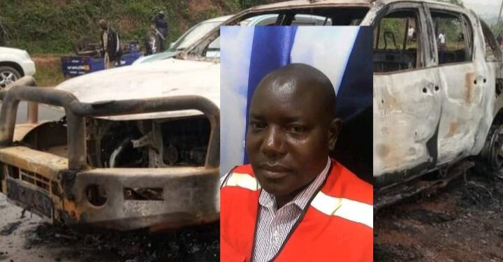 Bukwo CAO Charles Ogwang and his car that was set ablaze