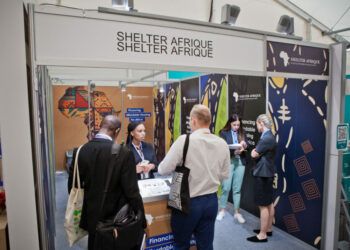 Delegates visit Shelter Afrique stand at the 11th World Urban Forum held in the Polish city of Katowice.