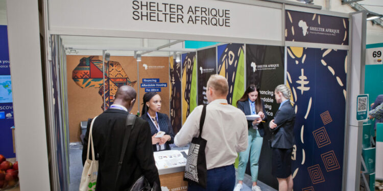 Delegates visit Shelter Afrique stand at the 11th World Urban Forum held in the Polish city of Katowice.