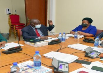 Murulu Mukasa (2nd L) appearing before the committee chaired by Hon. Fox Odoi (R). On his left is PS Bitarakwate