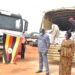 The Minister for Relief, Disaster Preparedness and Refugees, Mr Hilary Onek (left) and Napak District Woman MP Faith Nakut flag off relief food to Karamoja at Office of the Prime Minister stores in Namanve, Wakiso District on July 19, 2022. Courtesy Photo