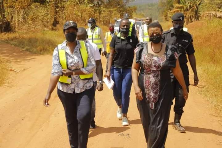 Minister Anifa Kawooya with UNRA ED Allen Kagina and staff