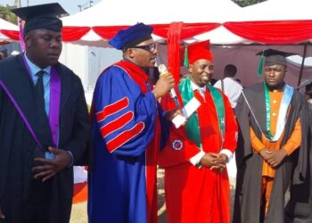 Jjumba Lubowa Aligaweesa and Prof. Wassajja Kiwanuka in the middle at a graduation function at Kigo