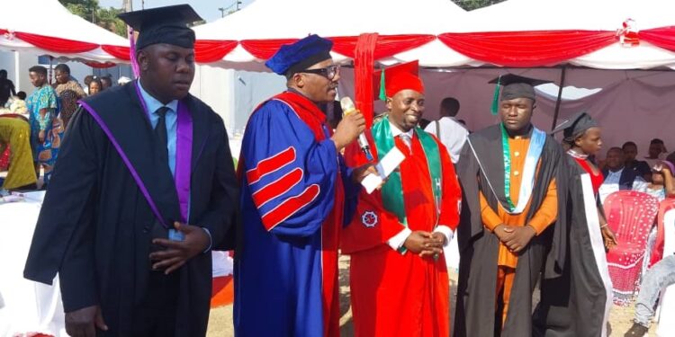 Jjumba Lubowa Aligaweesa and Prof. Wassajja Kiwanuka in the middle at a graduation function at Kigo