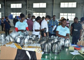 1.Workers at Sino-Uganda Mbale Industrial  Park assembling an electric kettle part of the investments at the park.PHOTO BY ANDREW ALIBAKU