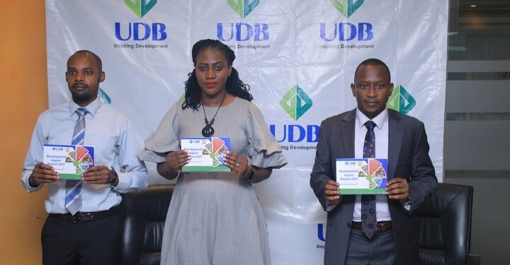 UDB officials present the Direct Impact report