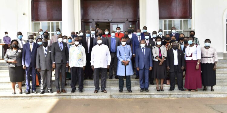 President Yoweri Museveni and the First Lady/ Minister of Education and Sports Janet Museveni in a group photo with the members of the Education Policy Review Commission (EPRC) and Ministry of Education and Sports Officials after a meeting at the State House Entebbe on 25th August 2022. Photo by PPU/Tony Rujuta.