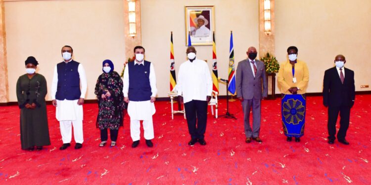 President Yoweri Museveni pose for a photo with the designated Pakistan High Commissioner to Uganda H.E. Muhammad Hassan Wazir and his team with the Ugandan Foreign affairs officials after presenting his credentials at the State House Entebbe on 3rd August 2022. Photo by PPU/Tony Rujuta.
