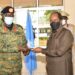 The President of the Federal Republic of Somalia H.E. Hassan Sheikh Mohamud receiving a souvenir from National Enterprise Cooperation (NEC) Managing Director Lt. Gen. James Mugira during the official visit at Luwero Defence Industries Nakasongola on 9th August 2022. Photo by PPU/Tony Rujuta.