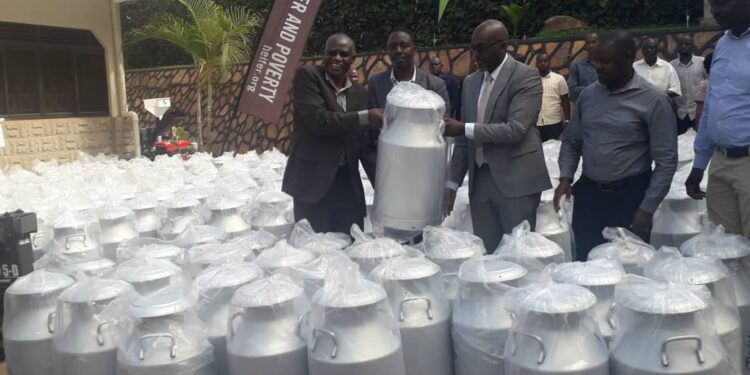 Heifer International giving out milk cans to dairy cooperatives