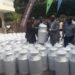 Heifer International giving out milk cans to dairy cooperatives