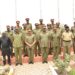 Maj-Gen-Leopold-Kyanda-in-agroup-photo-with-some-of-the-incoming-and-outgoing-Defence-Advisors