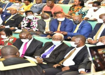 The Minister for Tourism, Wildlife and Antiquities, Hon. Tom Butime (5th, R) with colleague ministers in Parliament on 24 August 2022