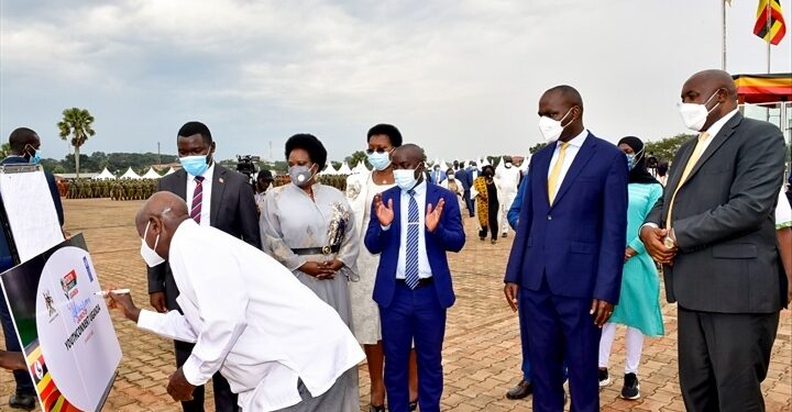 President Museveni launches the Youth Connect Uganda Programme during the International Youth Day celebrations in Gulu City on Friday as several ministers and other dignitaries look on. PPU Photo.jpg