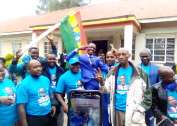 Owebeyi James (Blue Suit) celebrates successful nomination