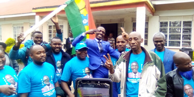 Owebeyi James (Blue Suit) celebrates successful nomination