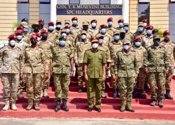 Gen Wilson Mbadi in a group photo with SFC soldiers