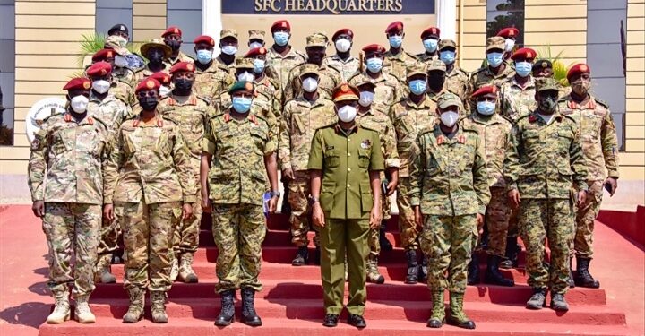 Gen Wilson Mbadi in a group photo with SFC soldiers