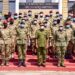 Gen Wilson Mbadi in a group photo with SFC soldiers