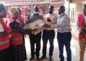 Sarafina Sickle Cell Society handing over the medicine to Mukono General Hospital sickle cell clinic management.