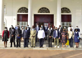 President Yoweri Museveni in a group photo with Coffee traders, Producers and growers after a meeting at State House Entebbe on 14th September 2022. Photo by PPU/Tony Rujuta.