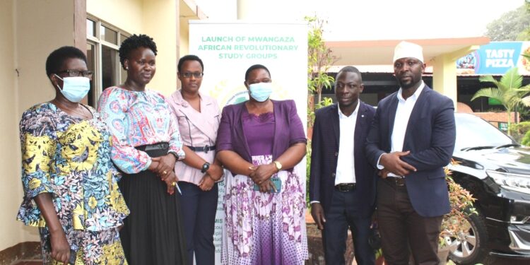 Minister for Presidency, Milly Babalanda (m) with some leaders of Mwaganza African Revolutionary Study Groups