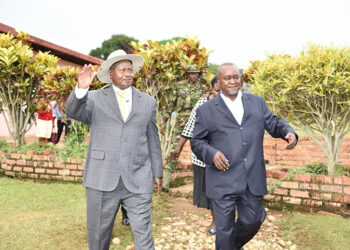 President Yoweri Museveni with former Vice President Gilbert Bukenya