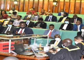 Finance committee chairperson, Hon. Keefa Kiwanuka, speaking to the report on the bill during the Bills Committee Stage