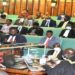 Finance committee chairperson, Hon. Keefa Kiwanuka, speaking to the report on the bill during the Bills Committee Stage