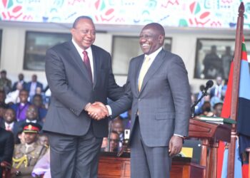 President Ruto having a light moment with outgoing President Uhuru Kenyatta