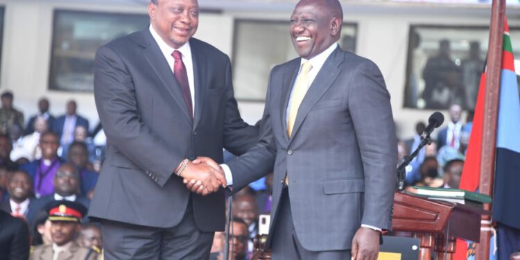 President Ruto having a light moment with outgoing President Uhuru Kenyatta