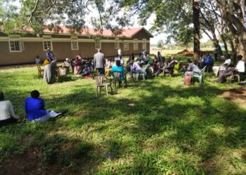 RDC Adiama with his deputy Odongo in a meeting with PWD leaders