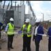 The Managing Director of Eskom Uganda Ms Thozama Gangi(centre) join by departmental heads during the commissioning the three generator transformers behind on Thursday.PHOTO BY ANDREW ALIBAKU