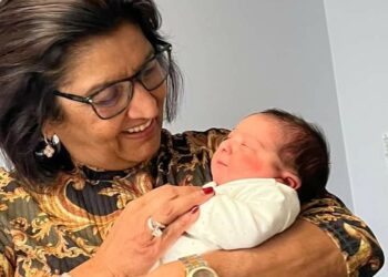 Mrs Jyotsna Ruparelia with her grandchild