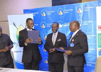 Left to right. Omuk.John Kitenda(Head Royal Treasury of Buganda), Owek. Martin Kasekende(Chairman Buganda Land Board), Owek.Patrick Mugumbule (Speaker Buganda Lukiiko), Mr. Fabian Kasi(Centenary Bank MD) at the function