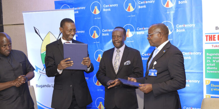 Left to right. Omuk.John Kitenda(Head Royal Treasury of Buganda), Owek. Martin Kasekende(Chairman Buganda Land Board), Owek.Patrick Mugumbule (Speaker Buganda Lukiiko), Mr. Fabian Kasi(Centenary Bank MD) at the function