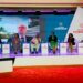 From left to right: Morrison Rwakakamba (Chairman Uganda Investment Authority), Antony Taubman on the screen (Director of Intellectual Property, WTO) , Mercy Kainobwisho (ED, URSB), Prof. Sandy Stevens Tickodri-Togboa (Chairperson, Kiira Motors Corporation), Dorothy Kisaka, (ED, KCCA) Eng.  Dorothy Okello (Dean school of Engineering, Makerere University) and Prof.  Ezra Suruma (Chancellor, Makerere University) during the 5th annual KTA Symposium at Speke Resort Munyonyo.