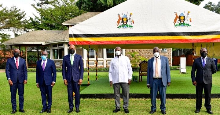 President Museveni poses for a photo with the Secretary-General of African Continental Free Trade Area Wamkele Mène (3rd L) after a meeting at Nakasero. (2nd R) is Trade Minister Francis Mwebesa and other officials