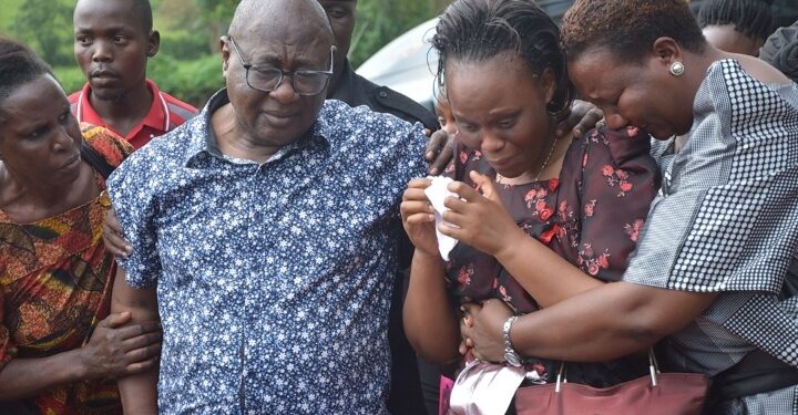 Minister Mayanja and family during their daughter's burial