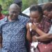 Minister Mayanja and family during their daughter's burial