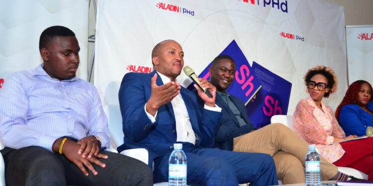 Left to Right  Nickson Mugalula, Manager Mobicast Media, Lenny Nganga, the Omnicom Media Group East Africa CEO, Ryan Majiwa the Digital Media Lead Saladin Media EA, Deedan Muyira  Event Host and Racheal Karanu  Head of Brand Partnerships/ Ad Sales-Africa at Mudondo addressing a panel discussion at the event in Kampala