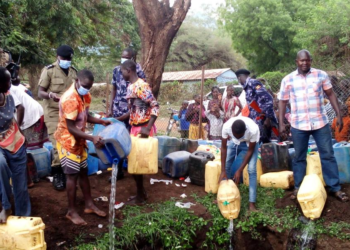 Police and locals pouring crude waragi at Moroto CPS
